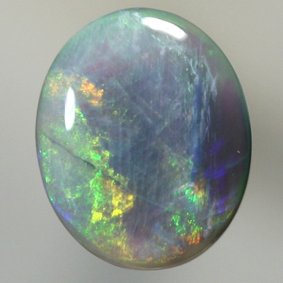 SOLID SEMI BLACK OPAL Neon orange turns to neon green in a broad rolling flash